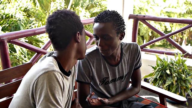 African twink blows partner's uncut dick before bareback sex