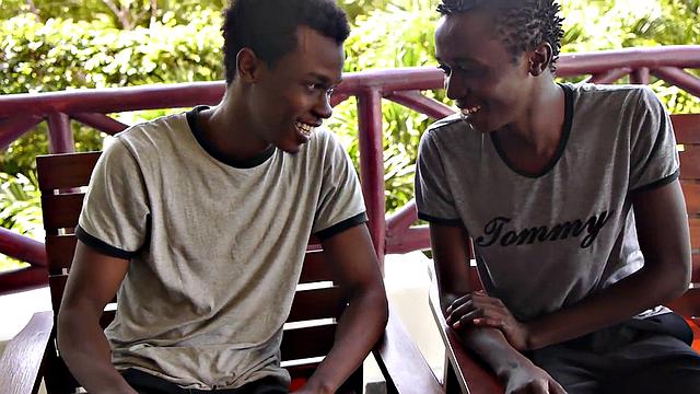 African twink blows partner's uncut dick before bareback sex