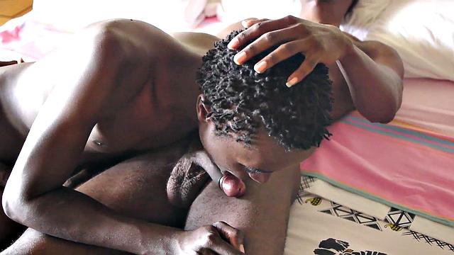 African twink blows partner's uncut dick before bareback sex