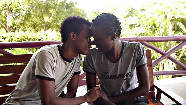 African twink blows partner's uncut dick before bareback sex