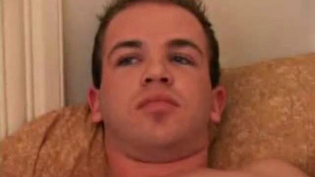 Austin Joseph lubes, strokes his cock, then shoves ribbed dildo up his ass for stimulation.