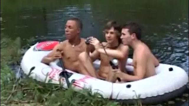 AJ, Brad and Michael are boating naked on the river. The young trio start giving each other blowjobs and kisses.