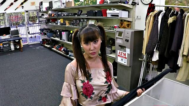A kinky Asian pawnshop babe suck and fuck before getting a messy facial