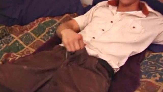 Sprawled out on the bed, Brock Labelli starts stroking. After the cameraman douses him with baby oil he continues to play with Brock's nipples, asshole, and cock.