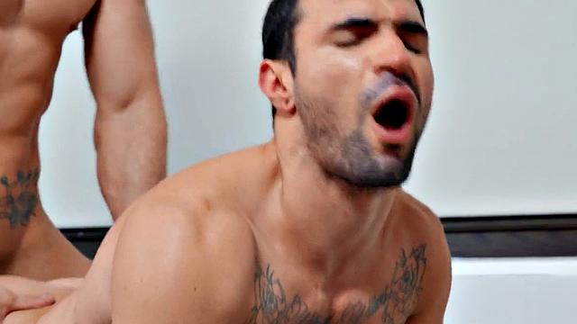 Deepthroating bareback banged by inked muscled hunk