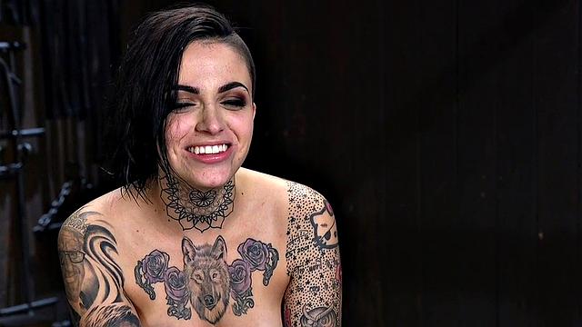 BDSM inked and pierced babe gets nipples and pussy clamps