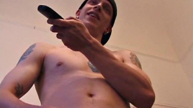 Returning from a bike ride, Shane strips naked and lubes up his hardening cock. He fingers himself, for added stimulation, while stroking his stiff meat. After edging a few times, the horny boy pumps out his warm cum load.