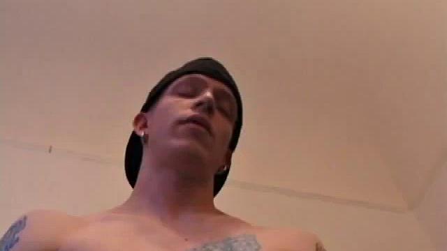 Returning from a bike ride, Shane strips naked and lubes up his hardening cock. He fingers himself, for added stimulation, while stroking his stiff meat. After edging a few times, the horny boy pumps out his warm cum load.