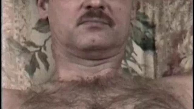 Neal strips down for a rough session with another working man
