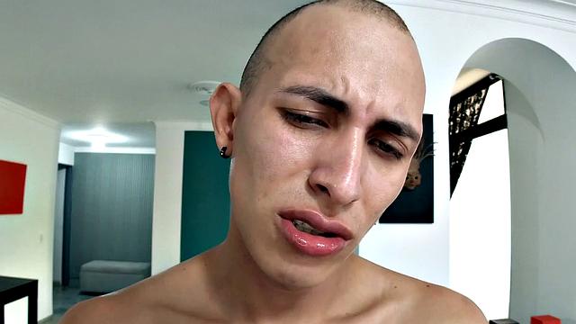 Slim and smooth Tenoch quickly strips naked and works up a stiff one. Standing, he starts beating off, while fingering for added stimulation.