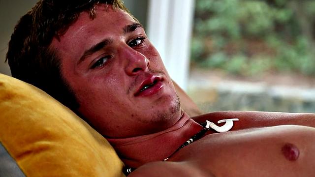 A young hunk tease his shaft before jerking off and taking a hot load