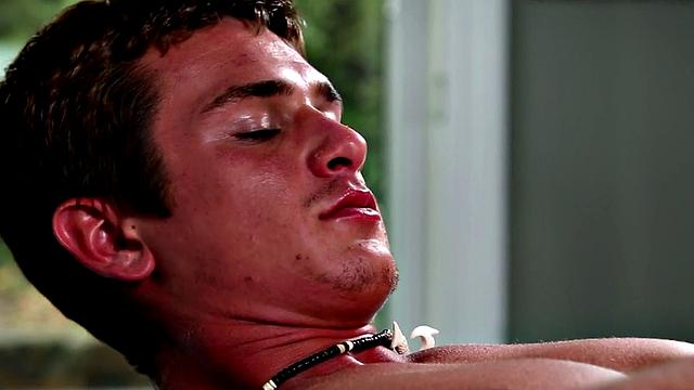 A young hunk tease his shaft before jerking off and taking a hot load