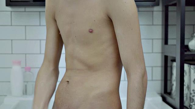 Kinky skinny teen gets a hot shower before jerking off to a cumshot