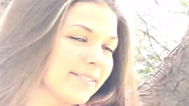 Sweet teen posing and showing her breasts in the open