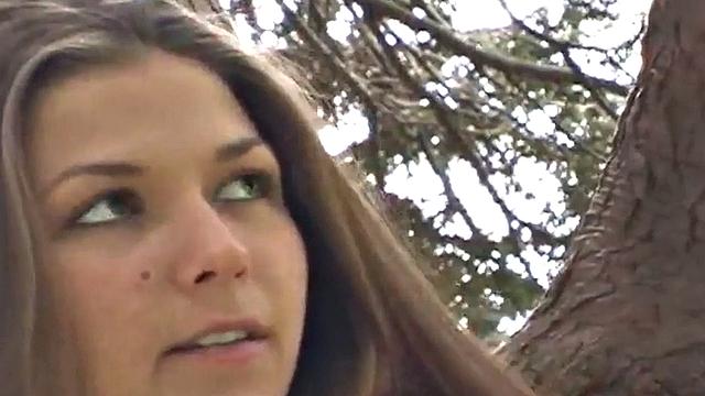 Sweet teen posing and showing her breasts in the open