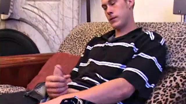 Young Brent Stenson relaxes on the sofa, working up a throbbing boner. He strokes with determination, pumping out a warm cum load onto his chest.