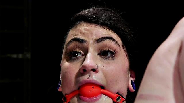 Curvy lezdom whipping her gagged submissive