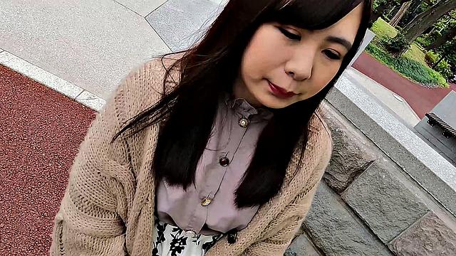 Nozomi Minami plays with our between big tits