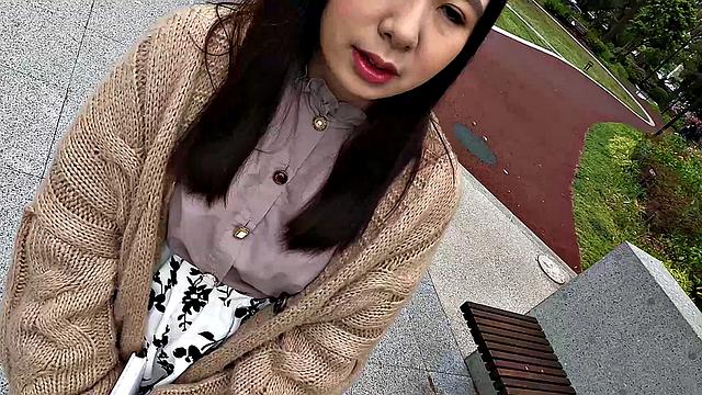 Nozomi Minami plays with our between big tits