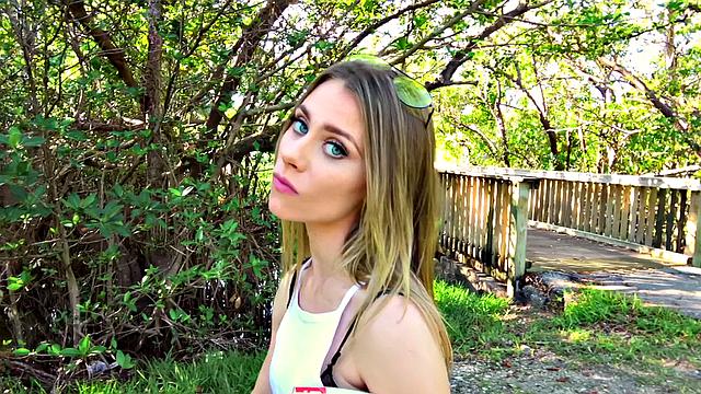 A blonde hottie ride her man's rod in a public park for some cash