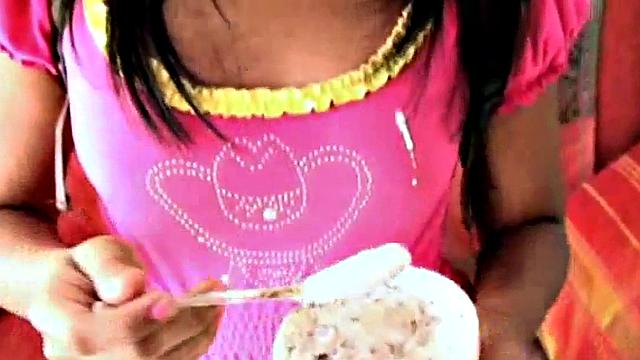 Teen with schoolbag spreads for oral