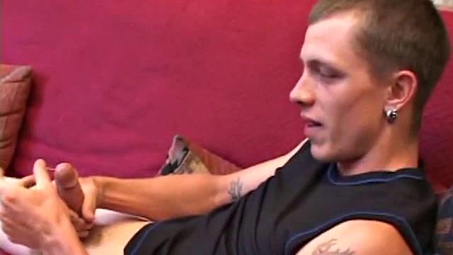 Proud of his rigid cock, Shane kicks back and starts stroking. Stimulated by porn video, things get pretty busy, but all cums out in the end.