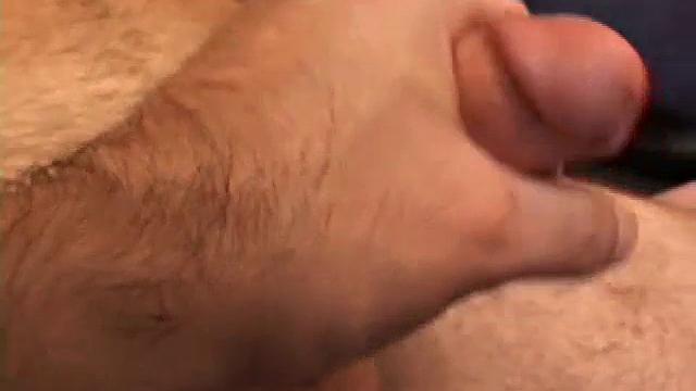 Hungover Vincenzo strips on the sofa, strokes his hard cock, and finishes with a powerful solo orgasm
