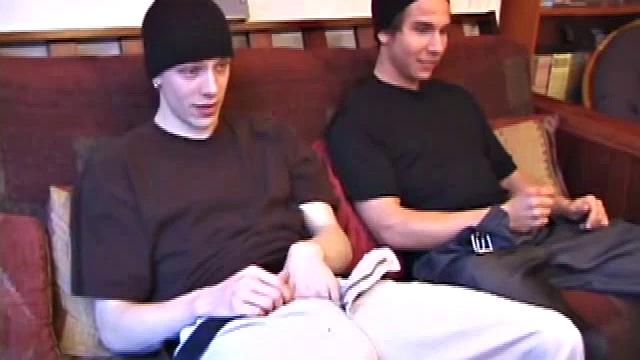 Shane and Brock sit side-by-side and begin watching their porn, while getting themselves ready for their task. Soon hands find their way into their pants. Cock in hand, Brock strokes and soon both he and Shane are stripping naked.