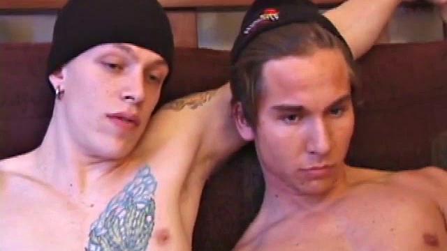 Shane and Brock sit side-by-side and begin watching their porn, while getting themselves ready for their task. Soon hands find their way into their pants. Cock in hand, Brock strokes and soon both he and Shane are stripping naked.