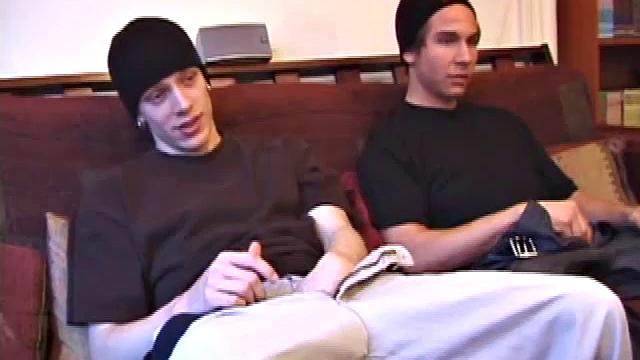 Shane and Brock sit side-by-side and begin watching their porn, while getting themselves ready for their task. Soon hands find their way into their pants. Cock in hand, Brock strokes and soon both he and Shane are stripping naked.