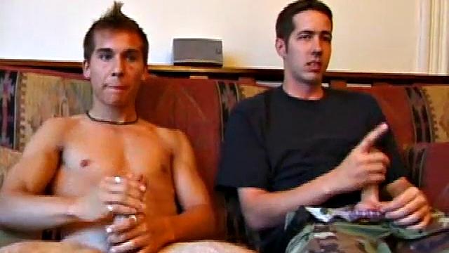 Eric Wilde seems a little nervous, tugging on his cock through his pants. Then Brock Labelli shucks his shirt and pulls out his hard cock. The two boys start stroking side-by-side.