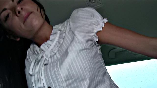 Watch this amateur brunette in shorts get pounded in a car POV-style