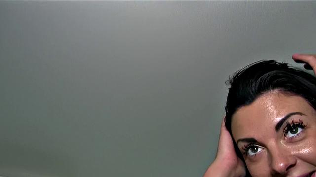 Watch this amateur brunette in shorts get pounded in a car POV-style