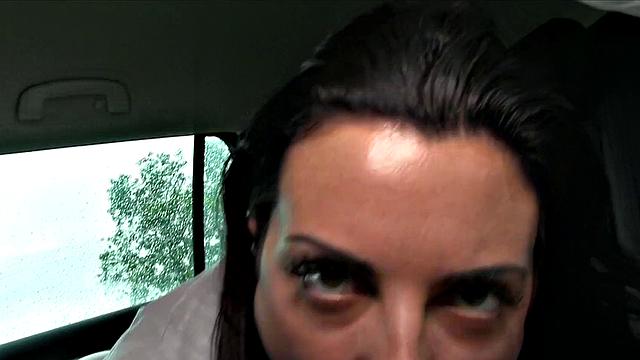 Watch this amateur brunette in shorts get pounded in a car POV-style