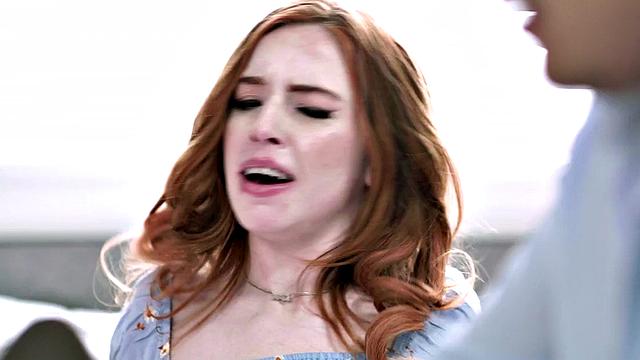 Petite redhead deepthroating while getting fingered