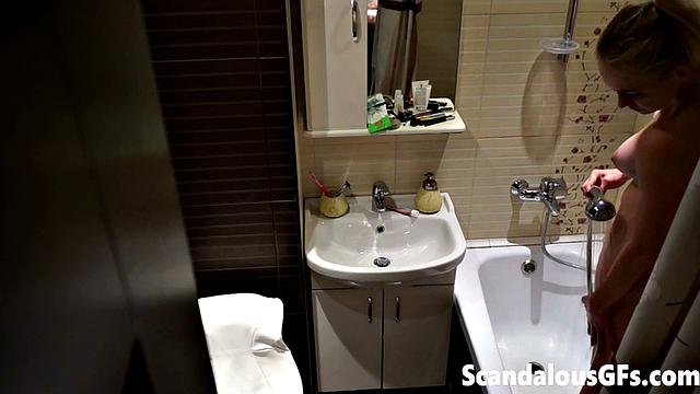 My naked girlfriend washing in the bathroom is exactly what you need to stroke