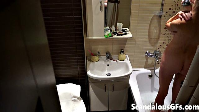 My naked girlfriend washing in the bathroom is exactly what you need to stroke