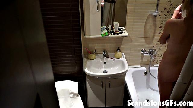 My naked girlfriend washing in the bathroom is exactly what you need to stroke