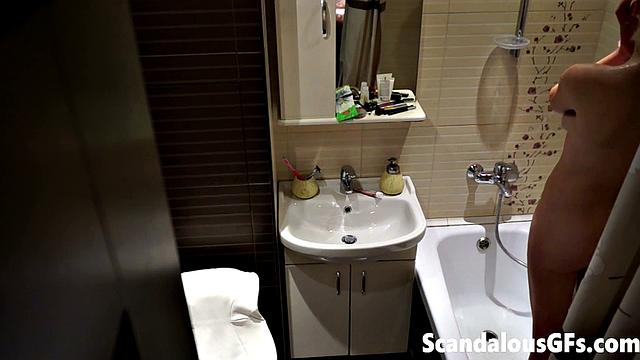 My naked girlfriend washing in the bathroom is exactly what you need to stroke