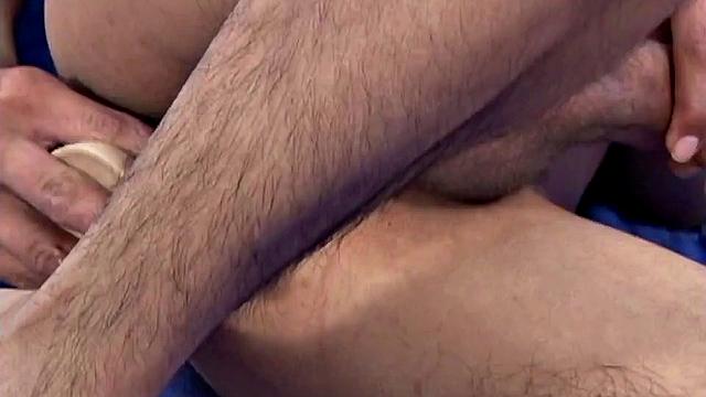 Latin twink Emanuel stretched out on bed, strips to underwear, pulls out uncut cock, gets hard, plays, fingers cock hungry hole