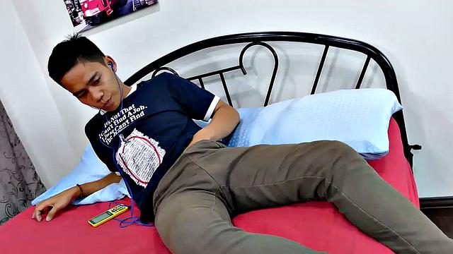Gay Asian twink Marcon tries to not jerk off so much by listening to some tunes. But his obsession with male feet keeps him thinking about feet most of the time. Marcon gives in and starts feeling horny, needing to have a wank.