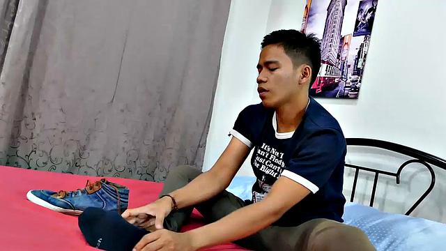 Gay Asian twink Marcon tries to not jerk off so much by listening to some tunes. But his obsession with male feet keeps him thinking about feet most of the time. Marcon gives in and starts feeling horny, needing to have a wank.