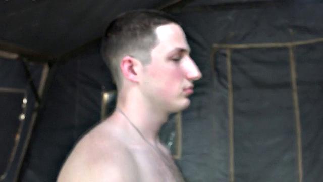 Watch these soldiers go wild in a wild outdoor interracial orgy with a submissive wearing glasses and a black tank top