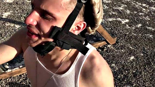 Watch these soldiers go wild in a wild outdoor interracial orgy with a submissive wearing glasses and a black tank top