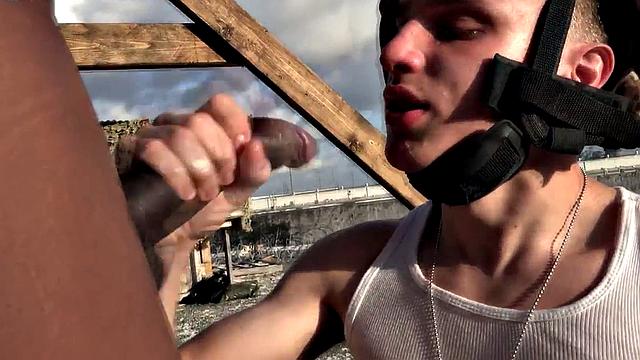 Watch these soldiers go wild in a wild outdoor interracial orgy with a submissive wearing glasses and a black tank top