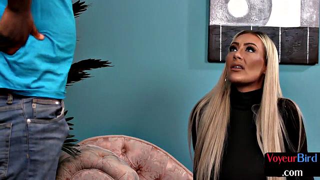 Watch this busty blonde MILF pleasure herself in a steamy solo session with a black guy in high heels