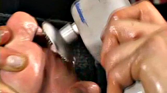Scott strokes his thick cock and moans while watching gay porn