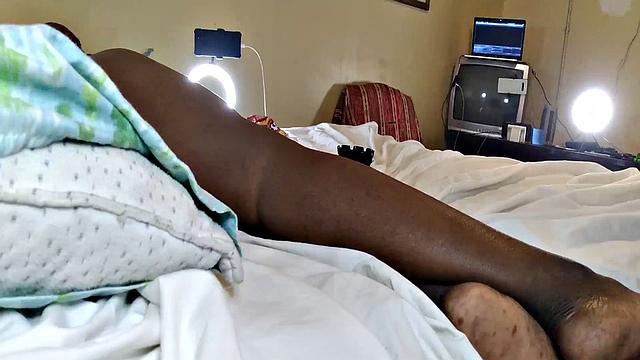 A hot American MILF masturbate in the bedroom with her bald pussy