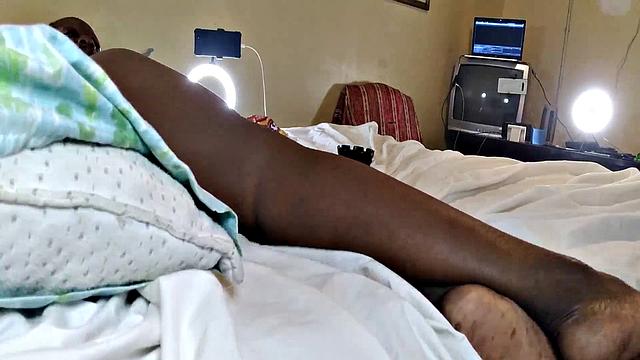 A hot American MILF masturbate in the bedroom with her bald pussy