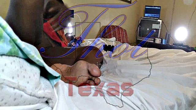 A hot American MILF masturbate in the bedroom with her bald pussy